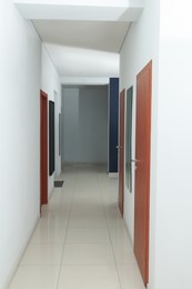 Photo of Modern empty office corridor with white walls