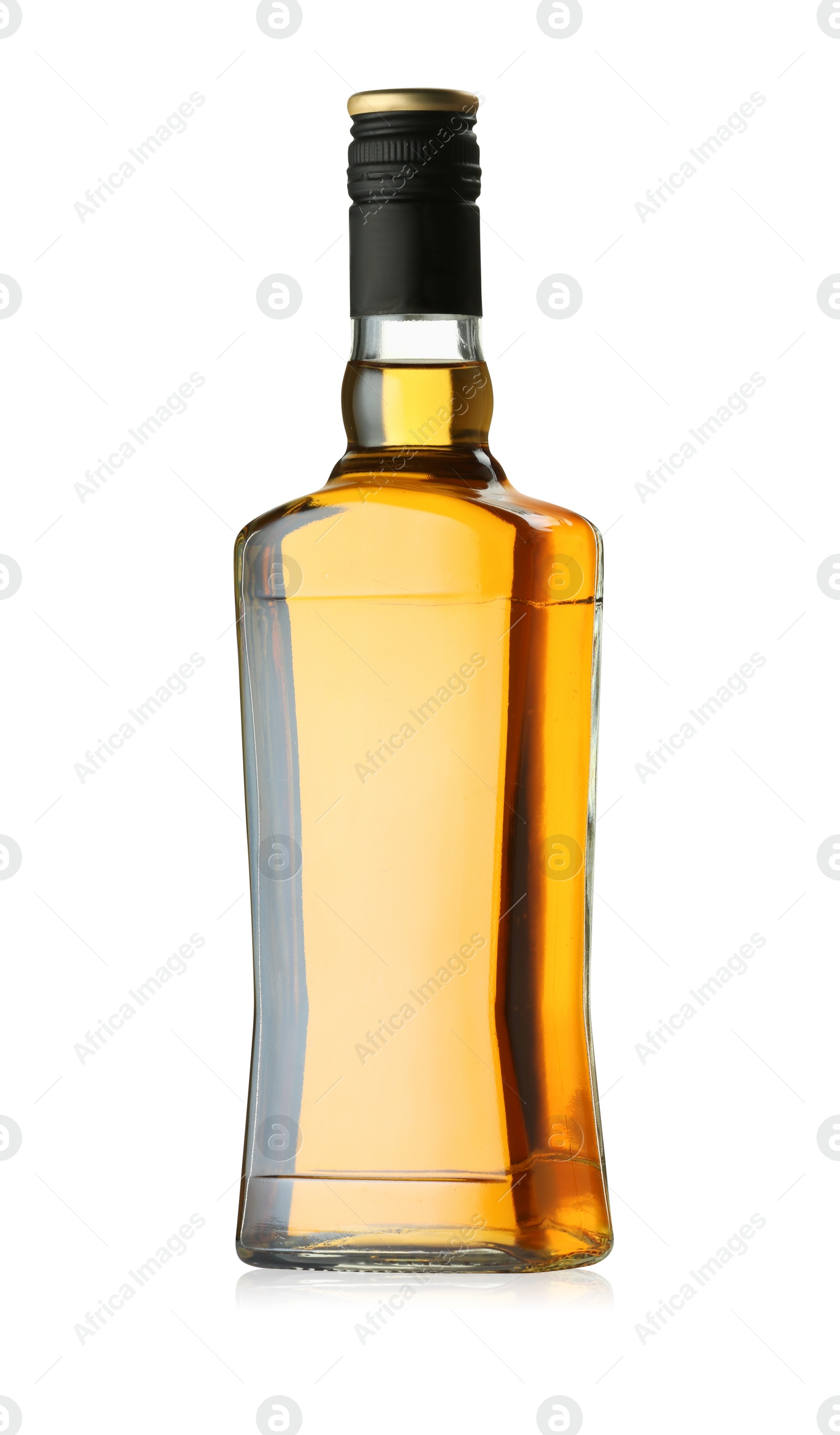 Photo of Whiskey in glass bottle isolated on white