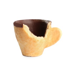 Bitten biscuit cup with chocolate isolated on white