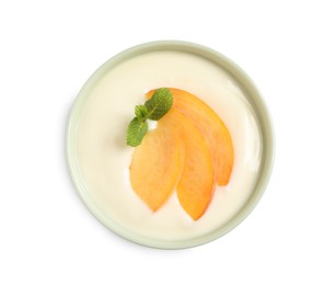 Photo of Delicious yogurt with fresh peach and mint in bowl on white background, top view