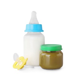 Photo of Healthy baby food, bottle with milk and pacifier on light grey background