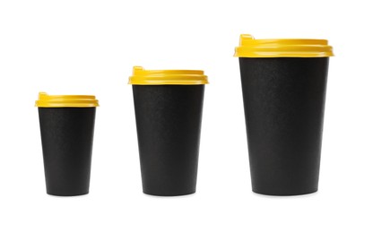 Image of Set with different takeaway coffee  cups on white background