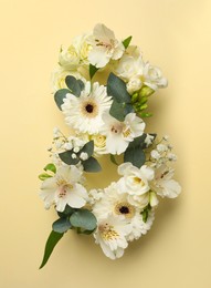 Photo of Number 8 made of beautiful white flowers on beige background, flat lay. International Women's day