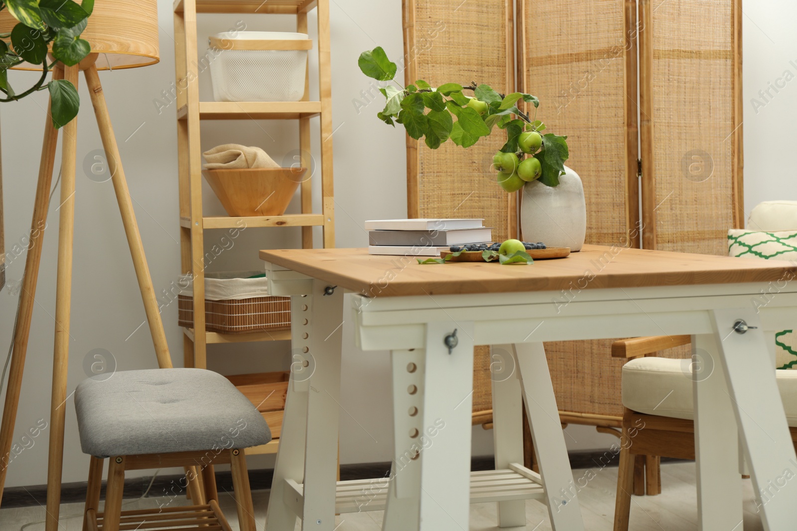 Photo of Beautiful room interior with stylish furniture and plants