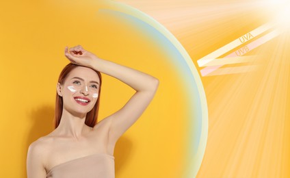 Image of Sun protection product as barrier against UVA and UVB. Beautiful young woman with sunscreen on face against orange background
