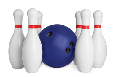 Photo of Blue bowling ball and pins isolated on white
