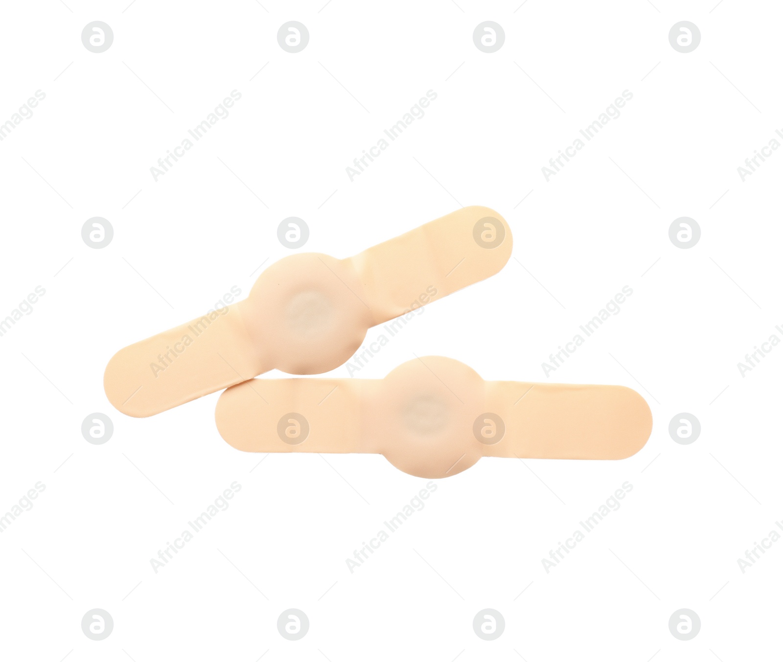 Medical sticking plasters isolated on white. First aid item Photo of Medical sticking plasters isolated on white. First aid item