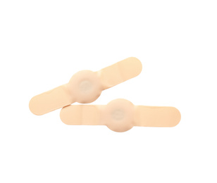 Photo of Medical sticking plasters isolated on white. First aid item