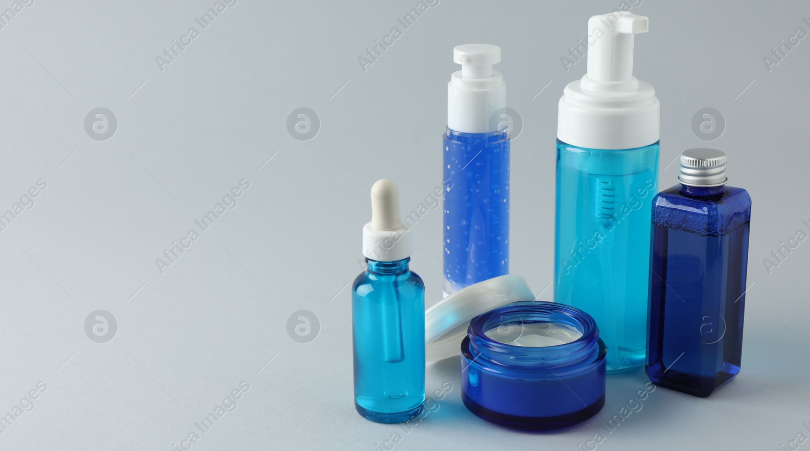 Photo of Set of luxury cosmetic products on white background. Space for text