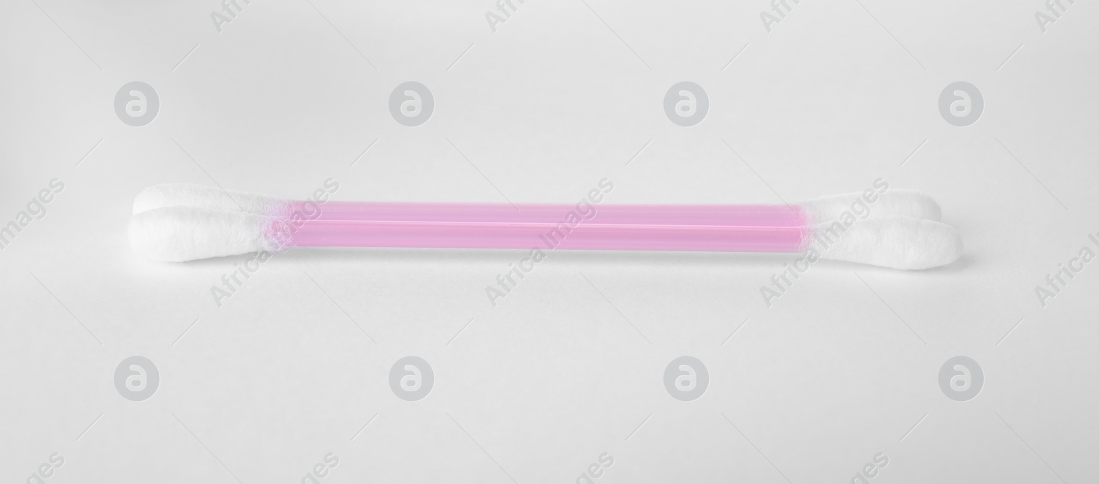 Photo of Clean cotton buds isolated on white. Hygienic product