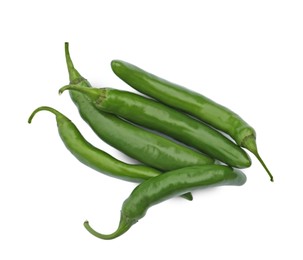 Green hot chili peppers on white background, top view