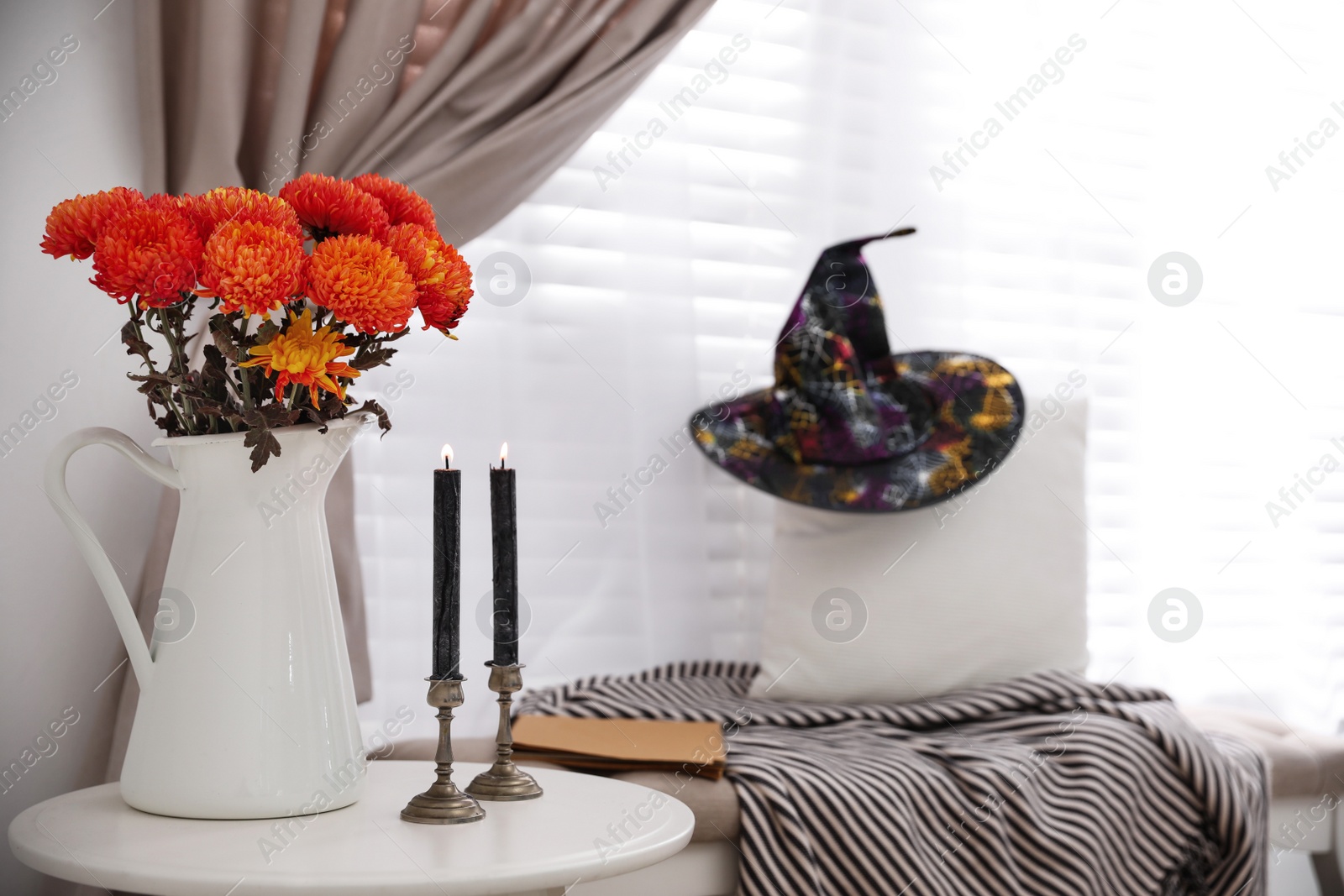 Photo of Modern room decorated for Halloween. Idea for festive interior