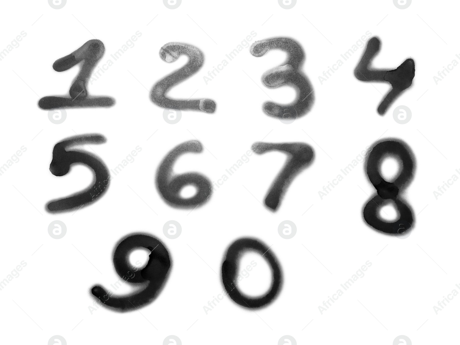 Photo of Numbers drawn by spray paint on white background