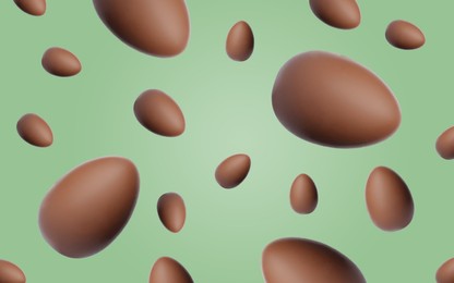 Image of Many chocolate eggs falling on pale light green background