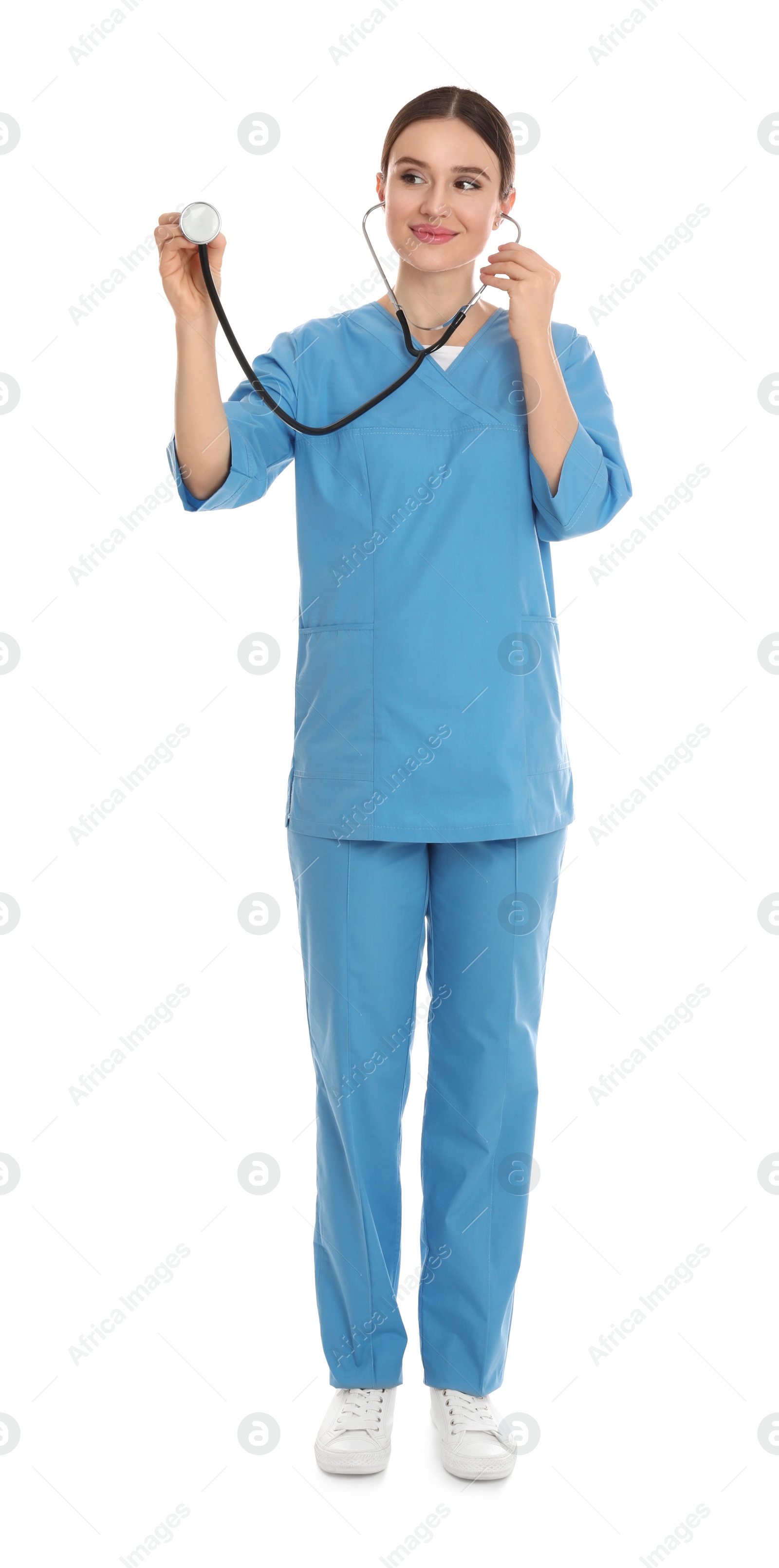 Photo of Full length portrait of doctor with stethoscope on white background