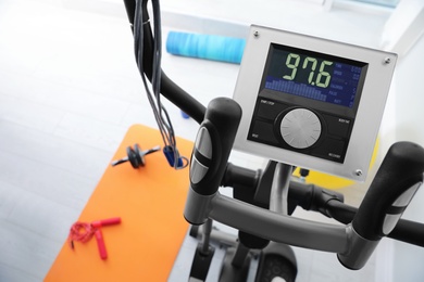 Photo of Control panel of modern elliptical machine cross trainer indoors