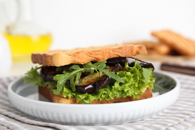 Delicious fresh sandwich with eggplant served on table