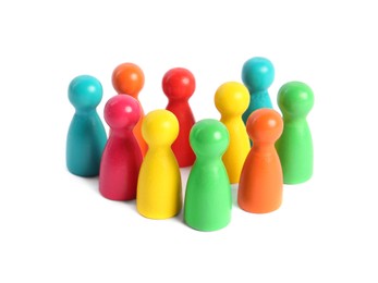 Photo of Colorful pawns on white background. Social inclusion concept