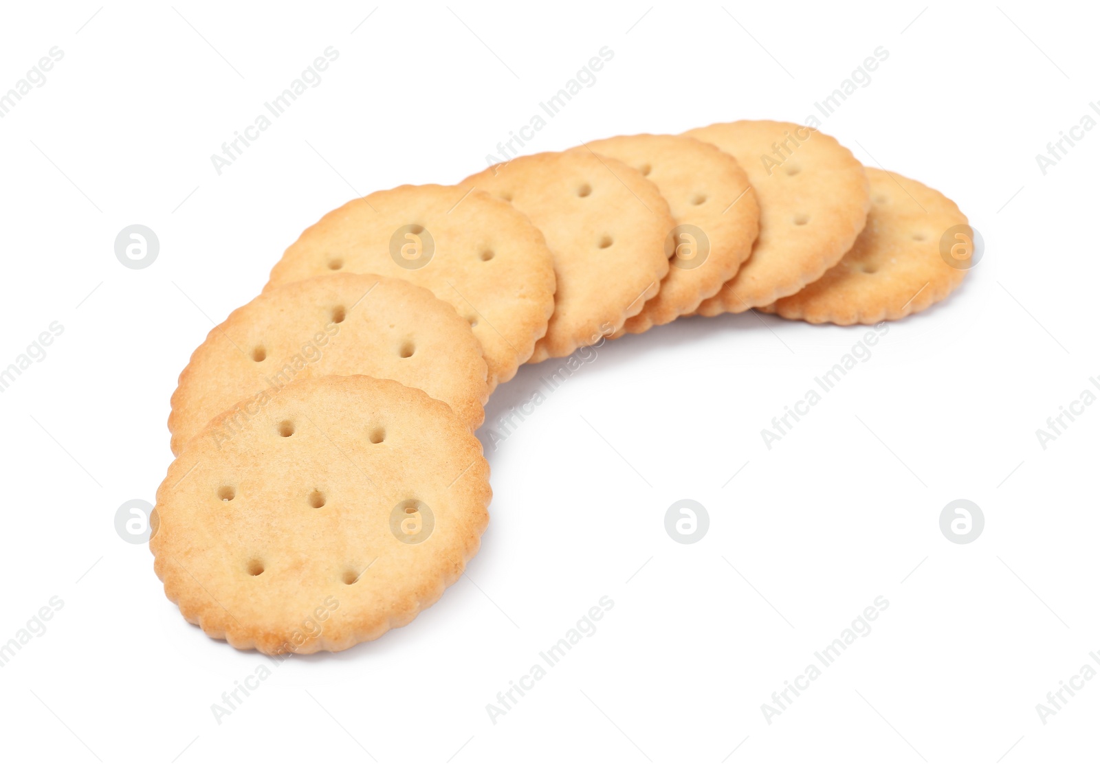 Photo of Tasty crispy round crackers isolated on white