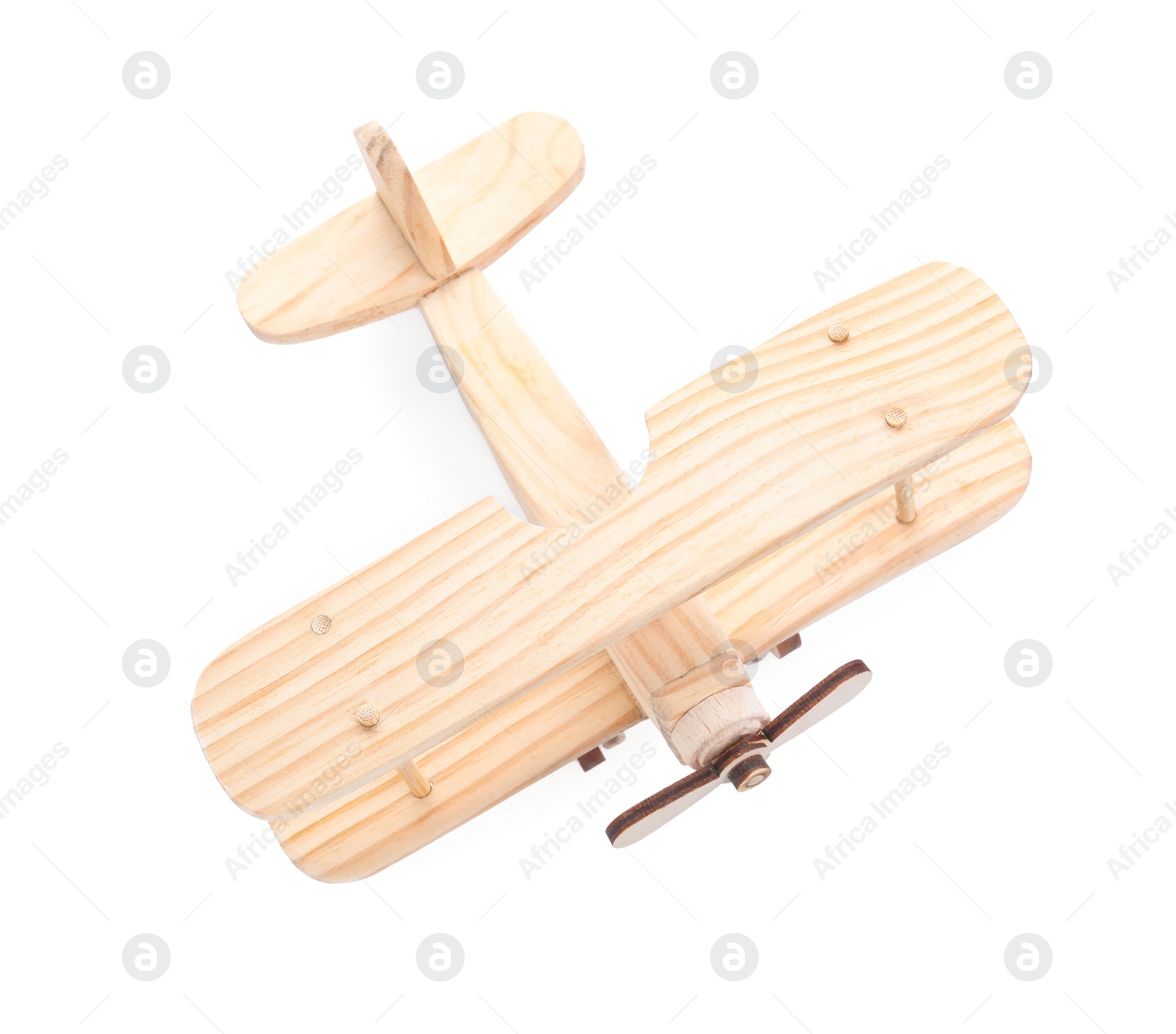 Photo of Wooden toy plane isolated on white, top view