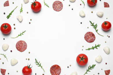 Photo of Composition with fresh ingredients and space for text on white background, top view. Pepperoni pizza recipe