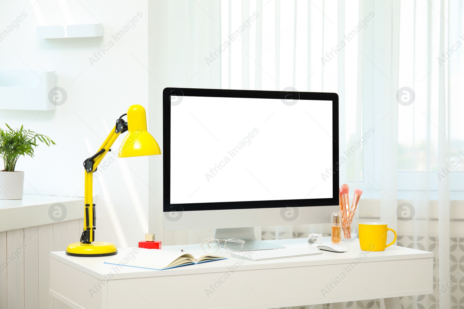 Photo of Comfortable workplace with modern computer on table