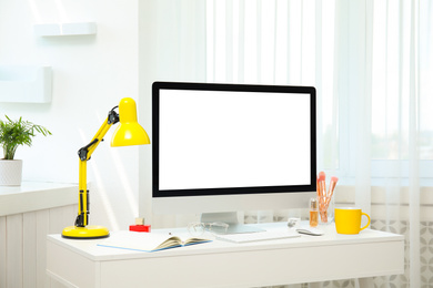 Photo of Comfortable workplace with modern computer on table