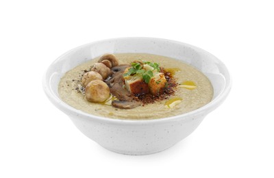 Photo of Delicious cream soup with mushrooms and croutons on white background