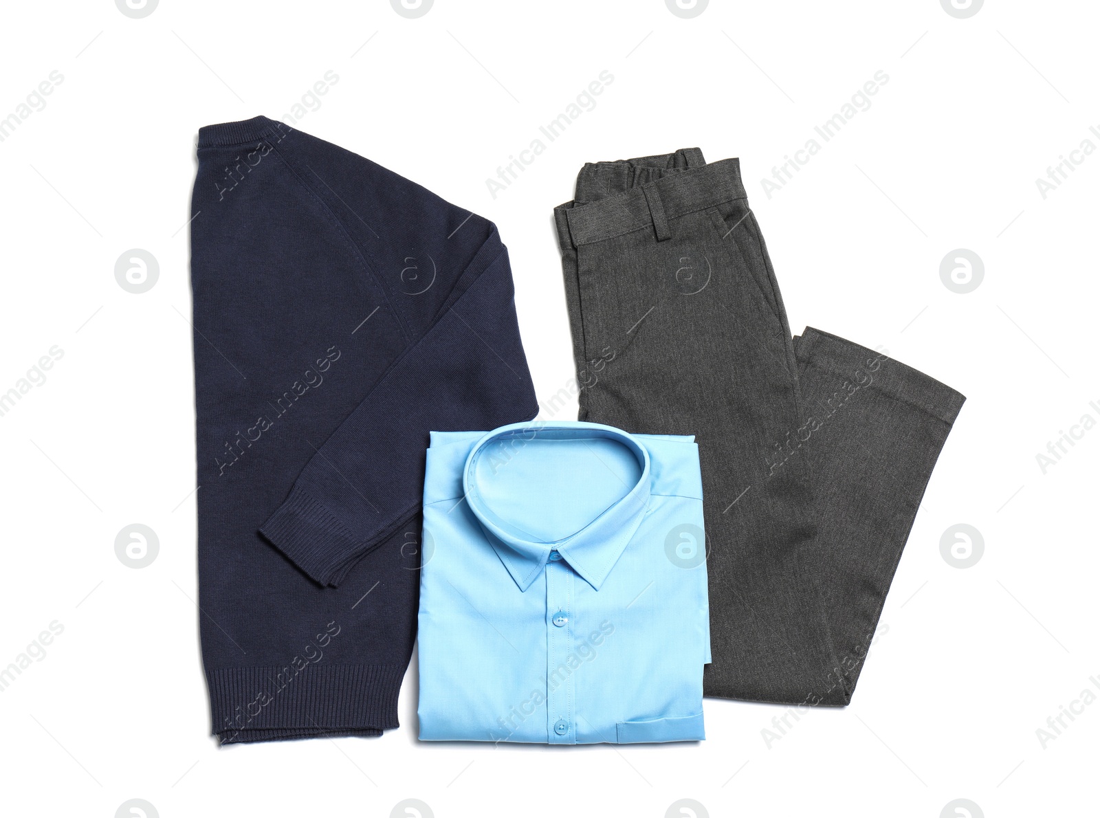 Photo of School uniform for boy on white background, top view