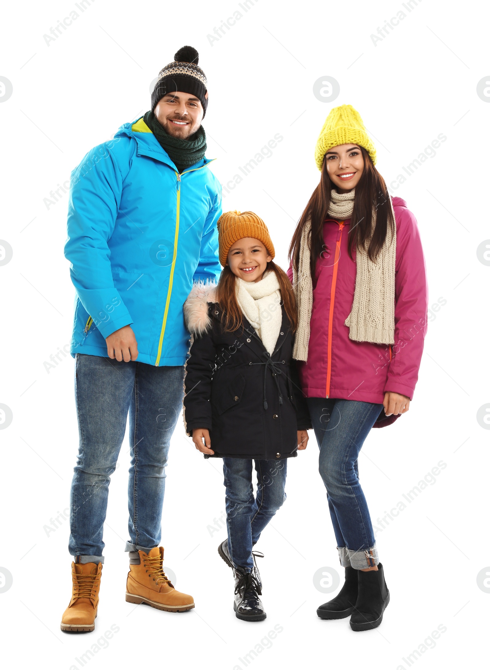 Photo of Happy family in warm clothes on white background. Winter vacation