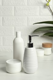 Photo of Bath accessories. Personal care products on white table