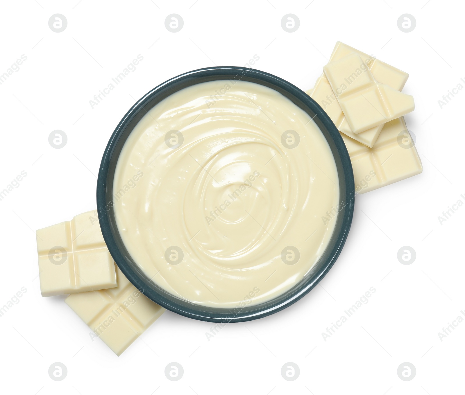 Photo of Tasty chocolate paste in bowl and pieces isolated on white, top view