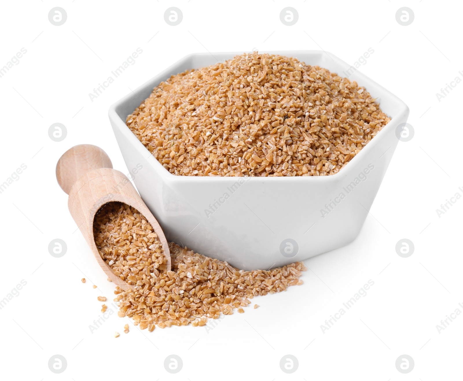 Photo of Dry wheat groats in bowl and scoop isolated on white