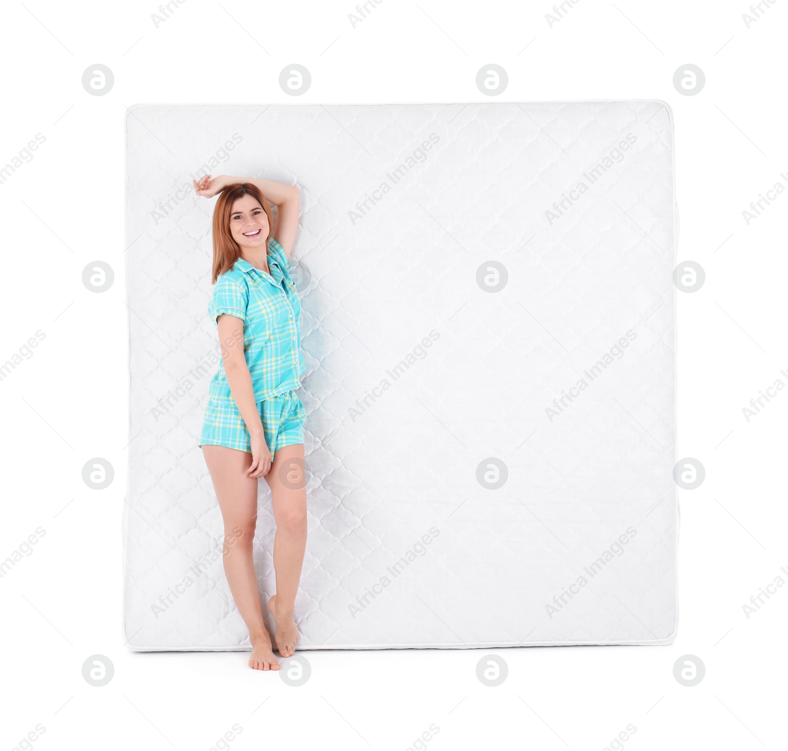 Photo of Woman with comfortable mattress isolated on white