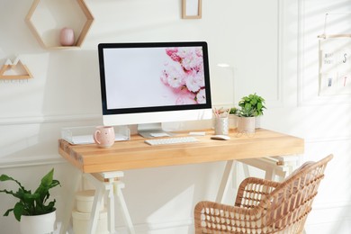 Photo of Stylish home office interior with comfortable workplace