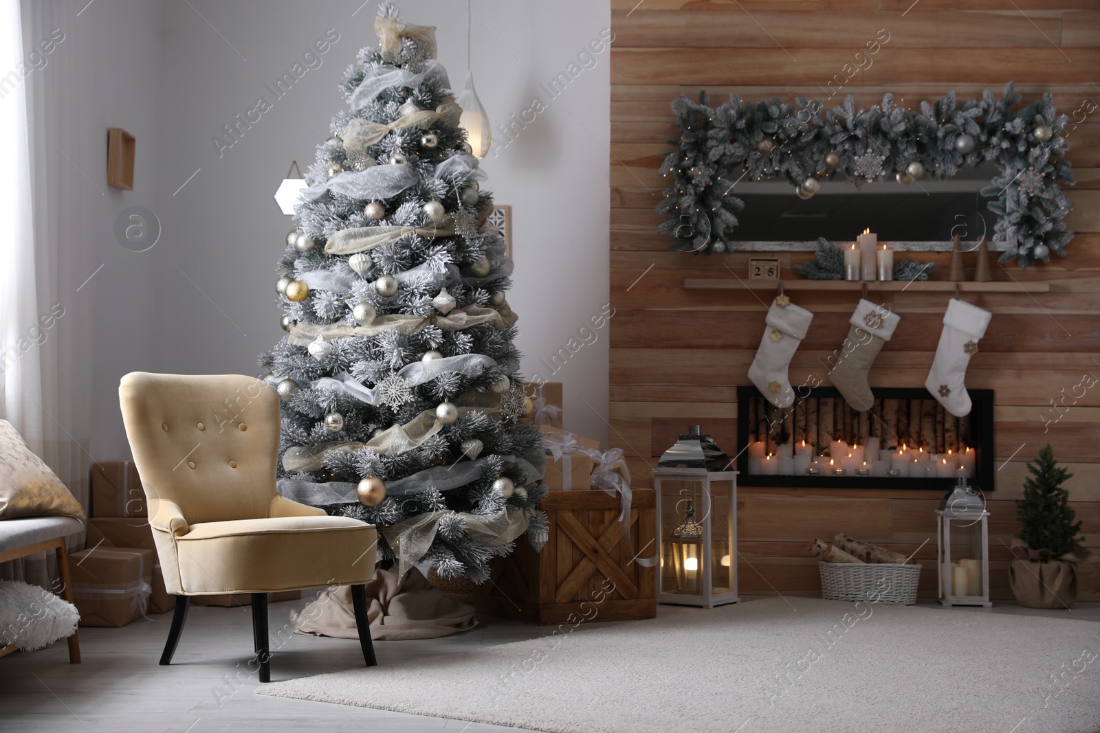 Photo of Festive interior with beautiful Christmas tree and gifts