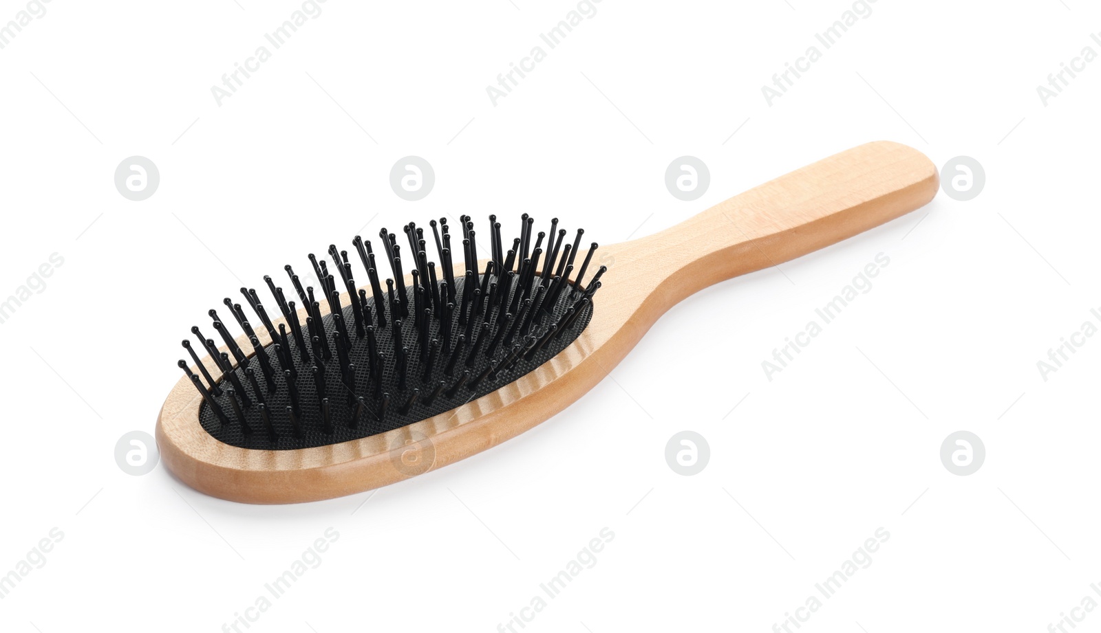 Photo of New wooden hair brush isolated on white