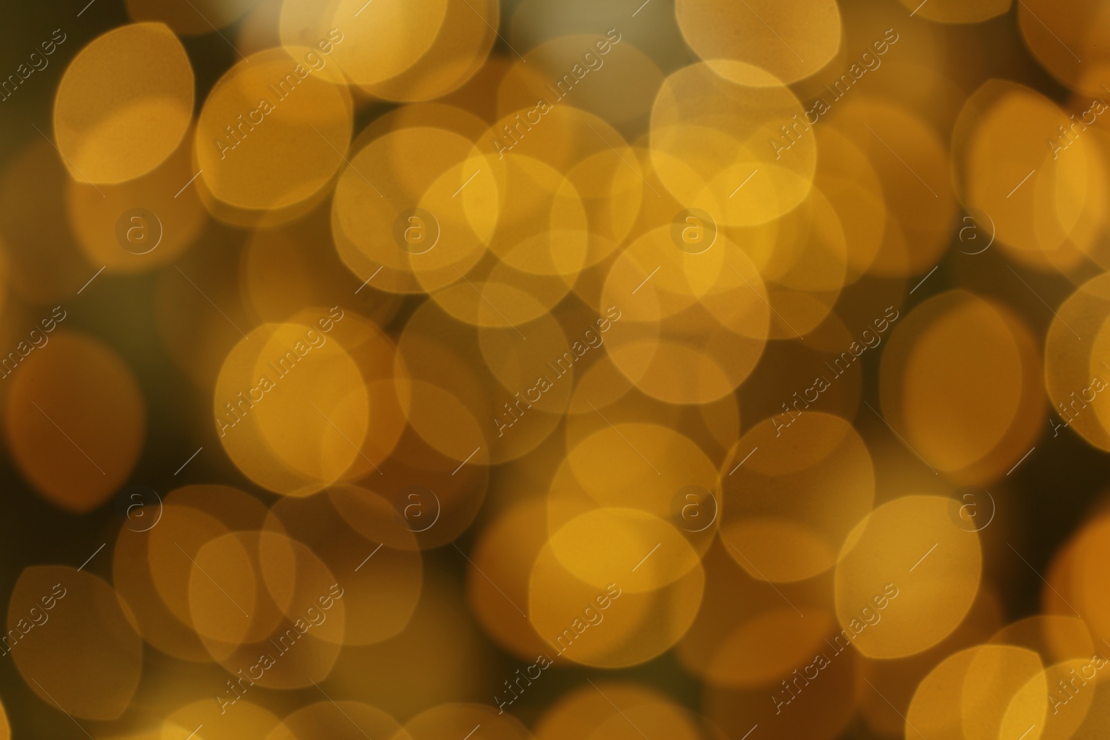 Photo of Blurred view of glowing Christmas lights as background. Festive mood