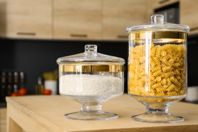 Products on wooden table in modern kitchen