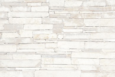 Texture of white stone wall as background