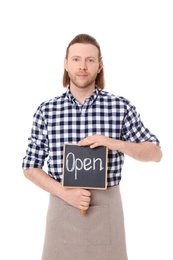 Photo of Male florist holding OPEN sign on white background