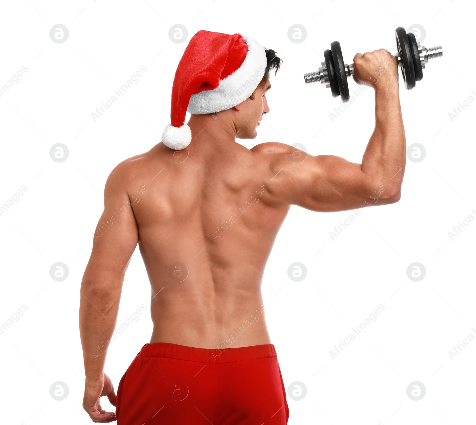 Photo of Sexy shirtless Santa Claus with dumbbell on white background