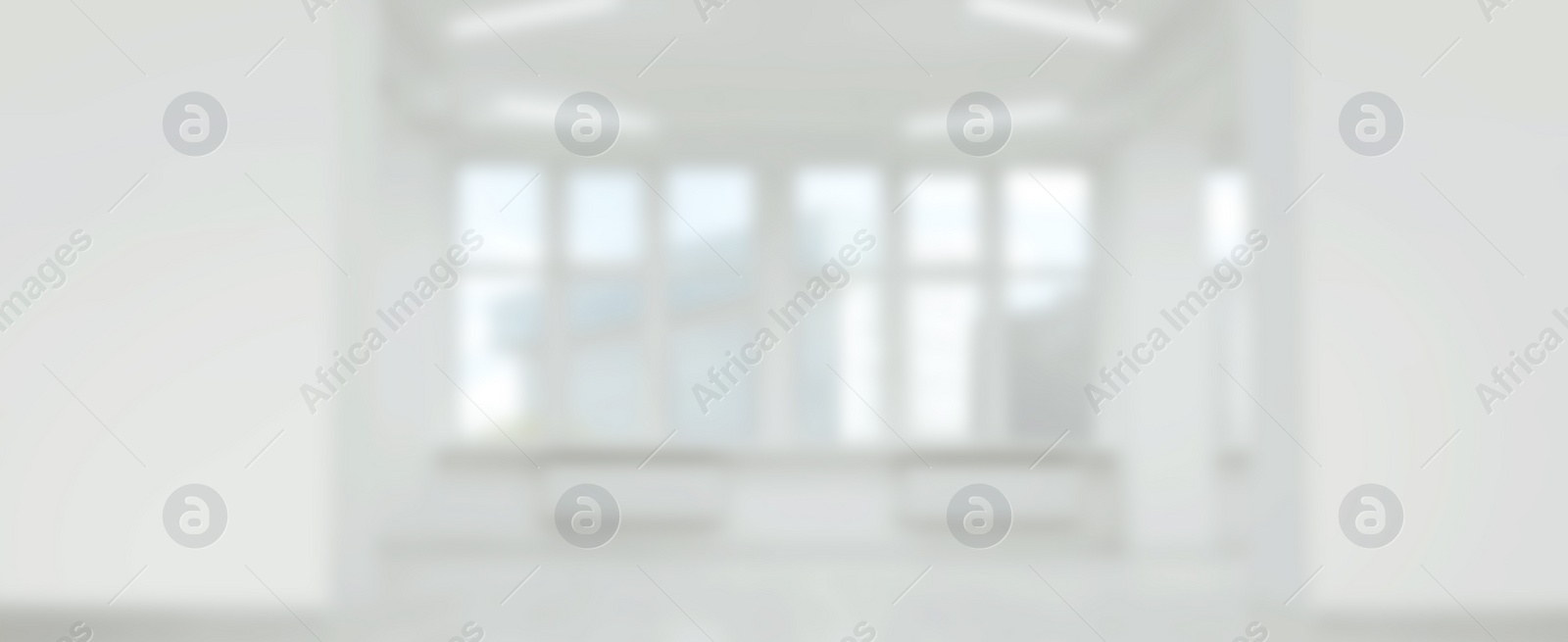 Image of Empty room with white wall and large window, blurred view. Banner design