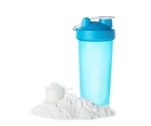 Scoop and pile of protein powder with bottle isolated on white