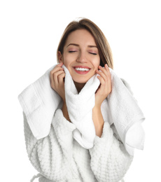 Photo of Young woman wiping face with towel on white background