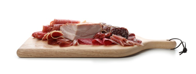 Cutting board with different meat delicacies on white background