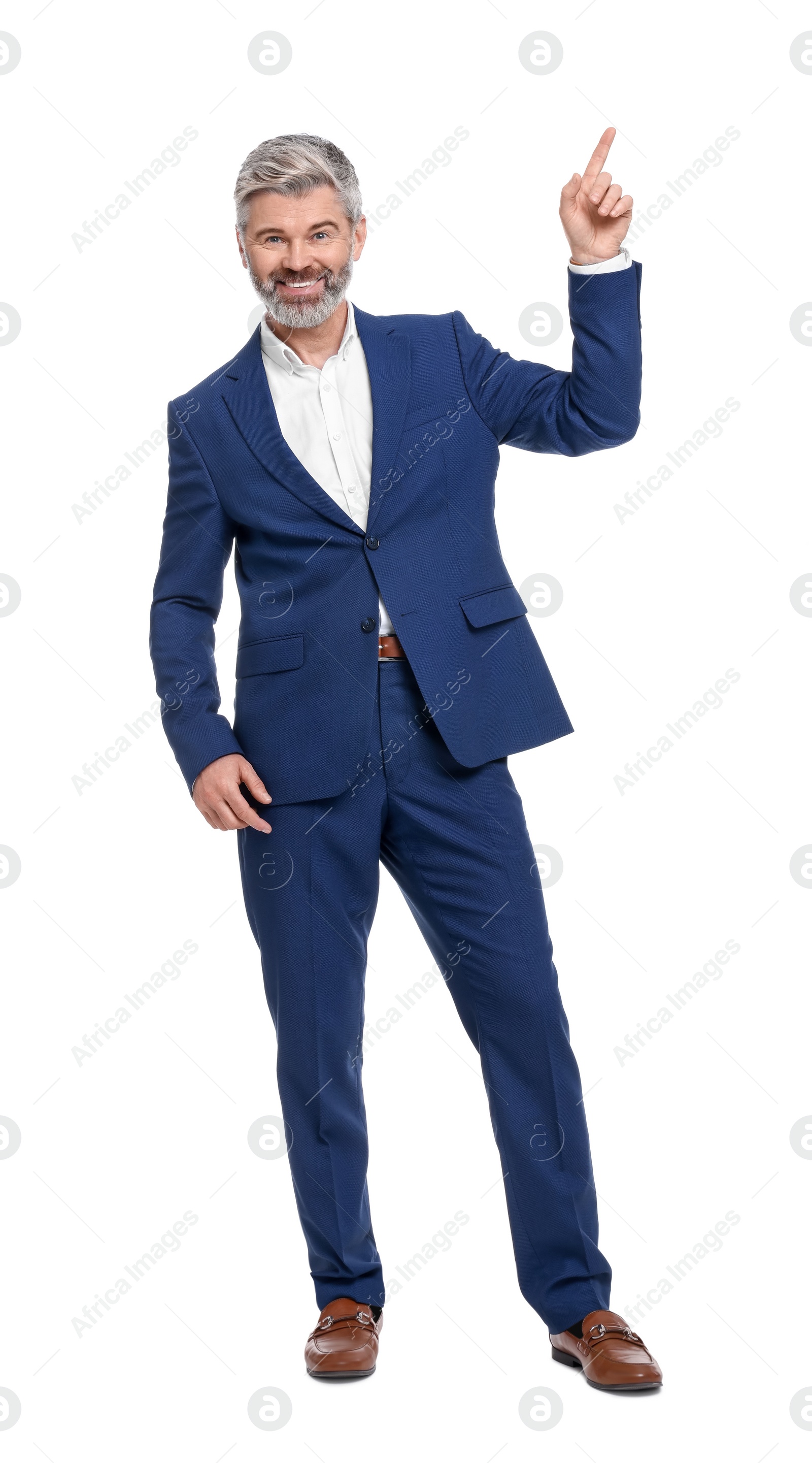 Photo of Mature businessman in stylish clothes posing on white background