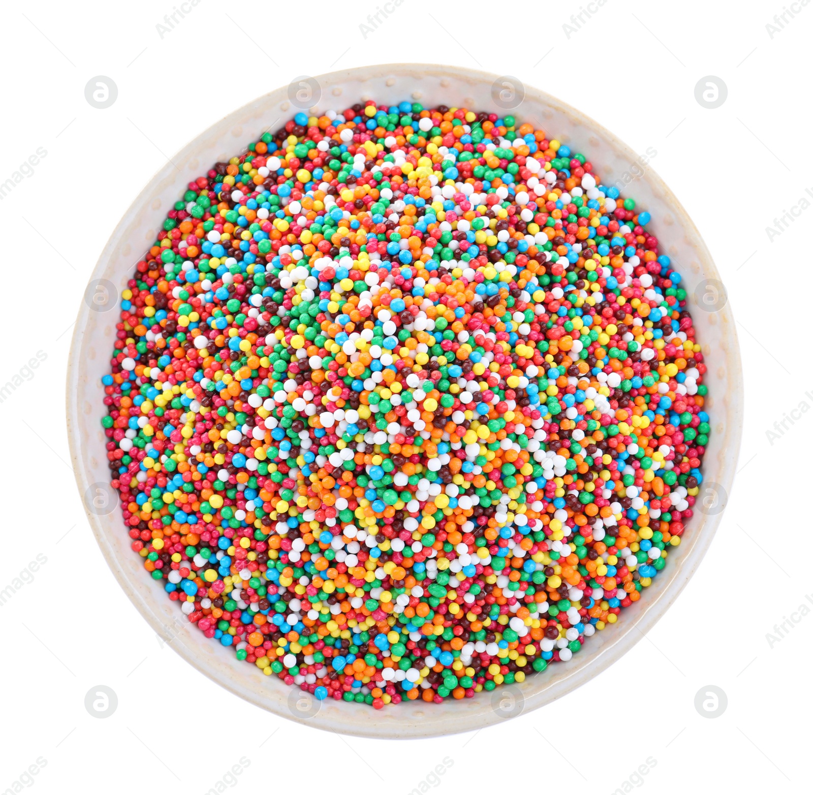 Photo of Colorful sprinkles in bowl on white background, top view. Confectionery decor