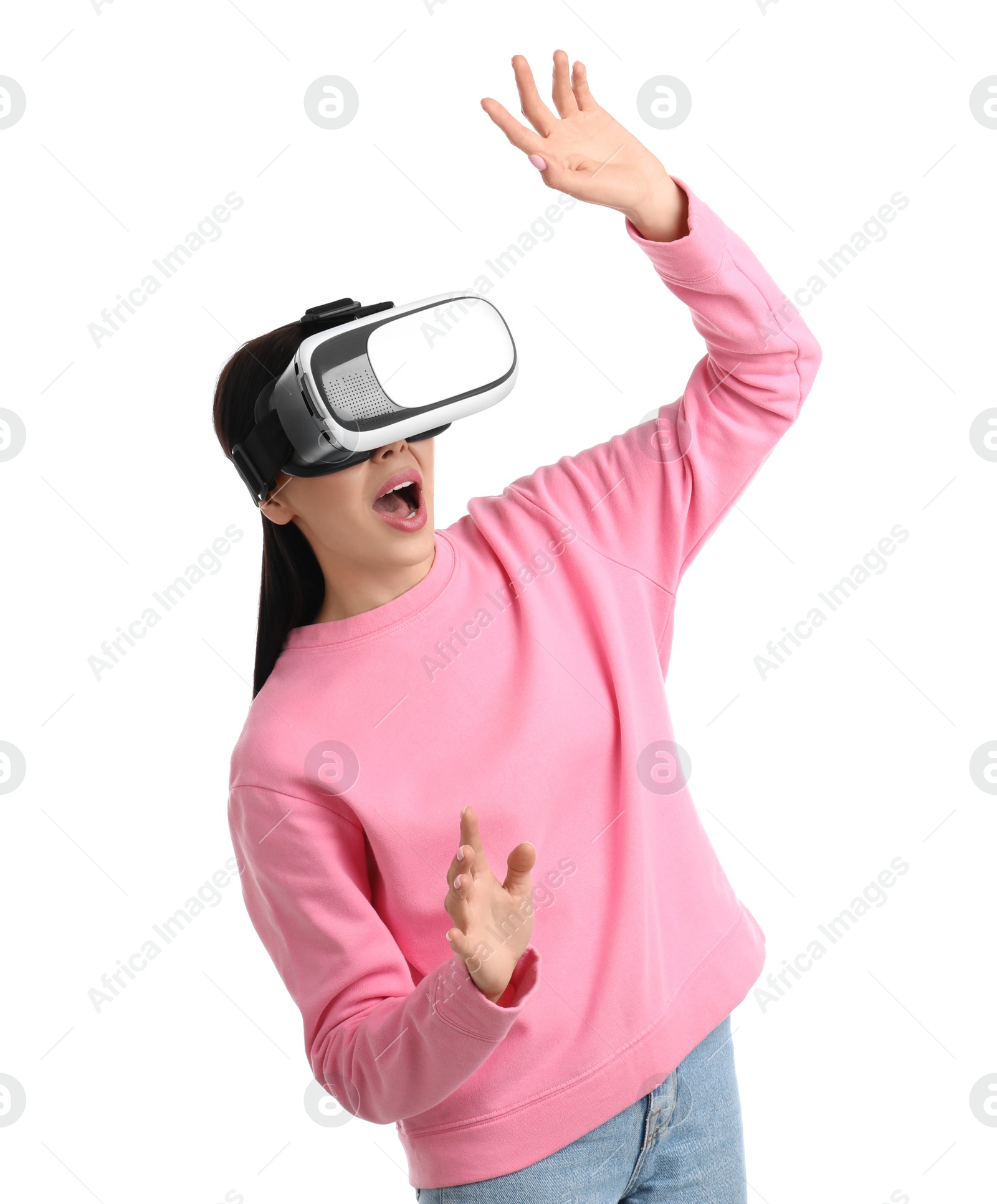 Photo of Woman using virtual reality headset on white background