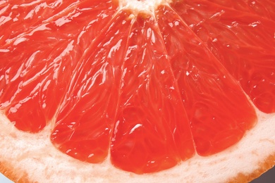 Photo of Texture of fresh ripe grapefruit, closeup view